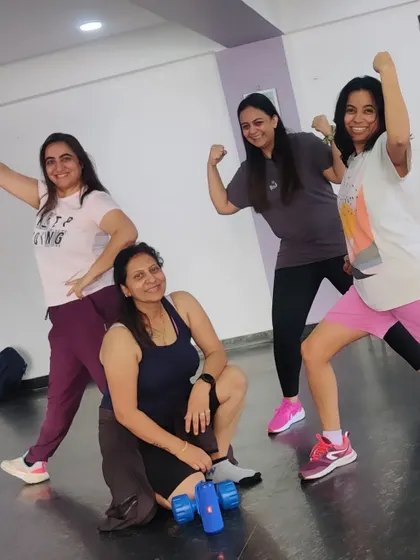 Another group of powerful women showing off their strength after a tough but rewarding class.