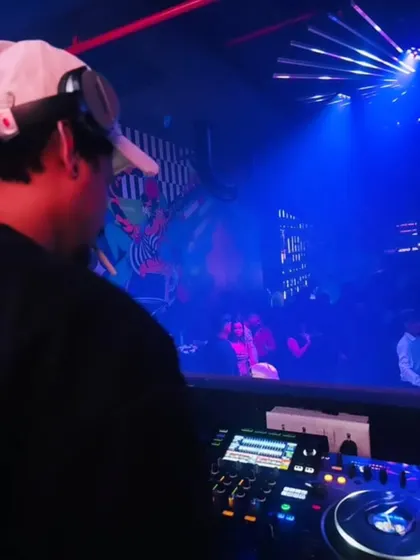 Here you can see my Pioneer DJ setup in action during a busy club night. I use top-tier equipment to ensure every mix is clean and powerful.