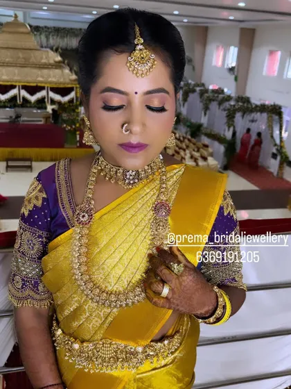 A beautiful shot of the bride with her eyes closed, highlighting her makeup and the jewellery details.