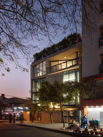 A duplicate of ID 75, this image captures the inviting glow of our studio in the evening. The large windows on the upper floors create a strong visual connection between our workspace and the surrounding urban environment.