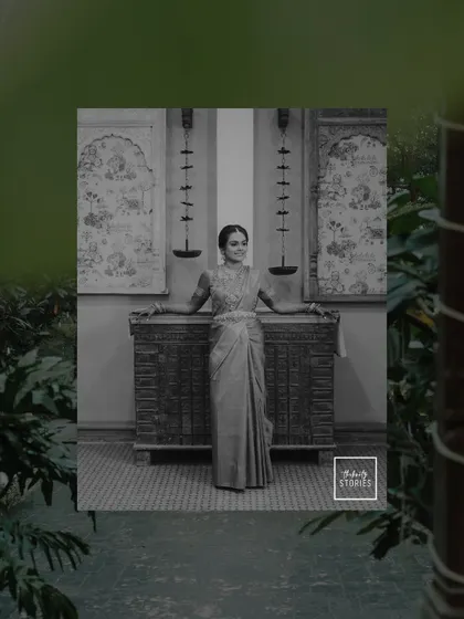 A creative black and white portrait of the bride, framed by lush greenery. The composition adds an artistic and mysterious touch.