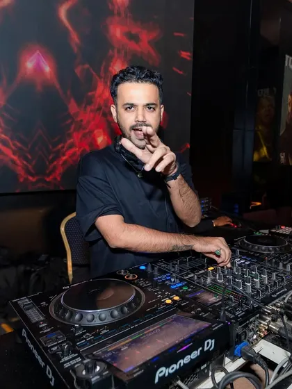 A confident point to the audience at Toy Room Pune. You are the reason we're here.