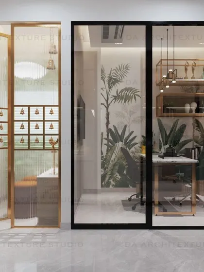 A view showing the glass partitions that separate the private cabin and prayer area, maintaining an open and light-filled feel throughout the office.