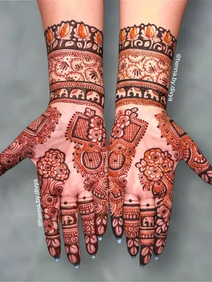 A modern and chic engagement design. This piece uses geometric shapes and floral patterns to create a unique, asymmetrical look.