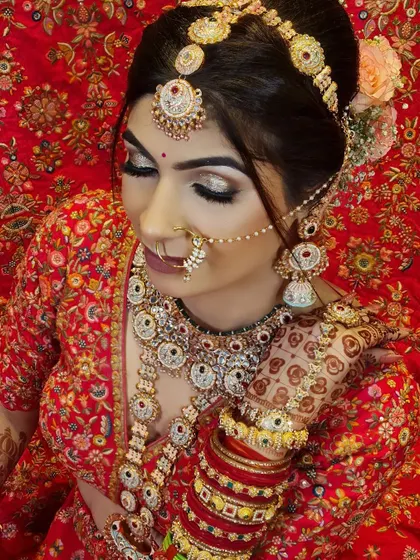 Another shot of my beautiful bride. The glittery eye makeup and traditional jewelry create a look that is both glamorous and timeless.