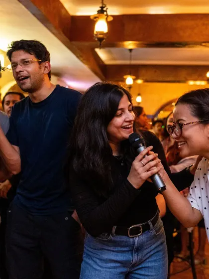 Sharing the mic and the moment. My karaoke nights are interactive and all about community.
