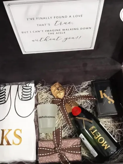 "I've finally found a love that's true, but I can't imagine walking down the aisle without you." The heartfelt note inside this groomsman proposal box makes it extra special.