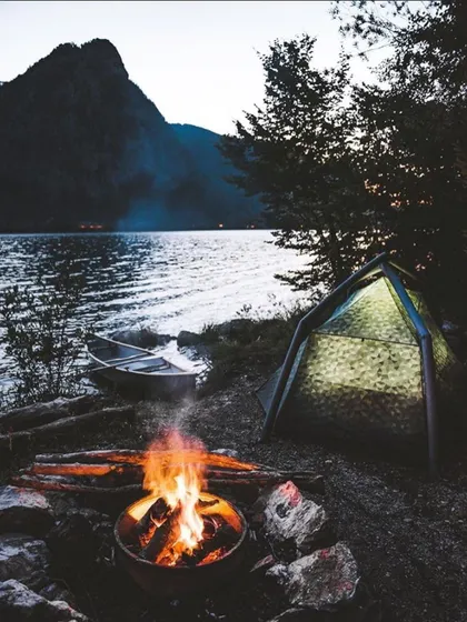 An evening at one of my favorite lakeside campsites. The setup is simple: a warm tent, a fire to keep you company, and a canoe ready for a quiet paddle on the water. This is what I mean by hitting the reset button.