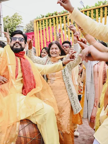 The groom's side brings the energy with dhol and dancing. I capture the excitement of the baraat and pre-wedding festivities.