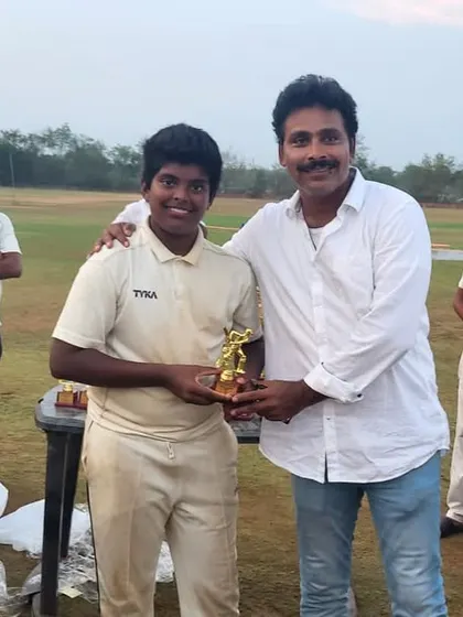 A player receiving his award during the Magadi Cricket Academy tour of Hyderabad in 2025.