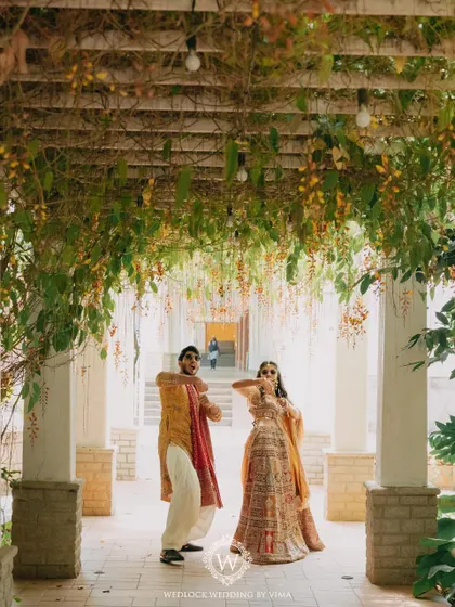 This Haldi ceremony was a burst of color and unforgettable moments. We used vibrant tissue flowers, playful origami birds, and colorful smoke bombs to bring the venue to life.
