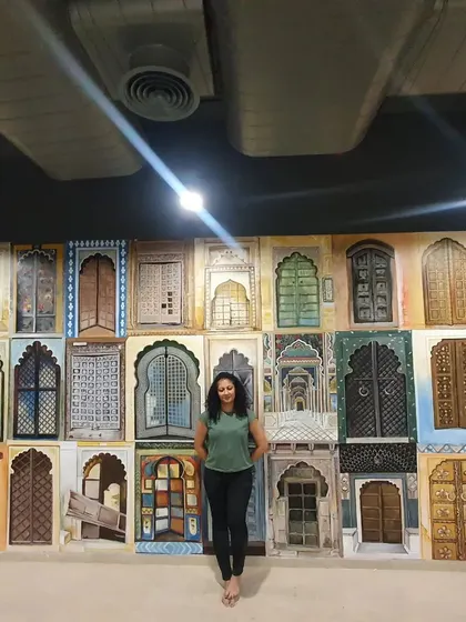 A duplicate shot of me with the 'Doorways of India' mural.