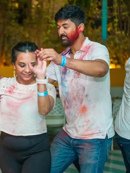 A fun moment from our Rang Barse Holi special. The white shirts were a perfect canvas for the celebration.