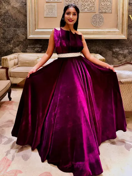 A final shot of the magenta velvet gown, capturing its full splendor and elegance.