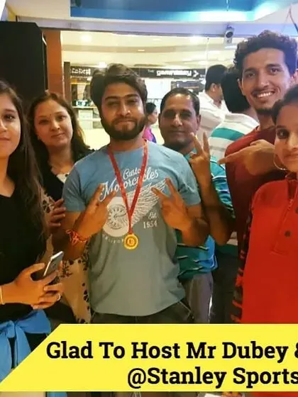 Mr. Dubey and his family celebrating a great day out. Group activities like archery are a wonderful way to bond and create shared memories.
