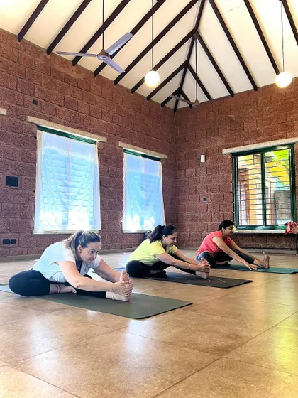 Modifications make our practice stronger, not weaker. These students are all experiencing a complete Janu Sirsasana, each using a modification that allows them to maintain an active and elongated spine.