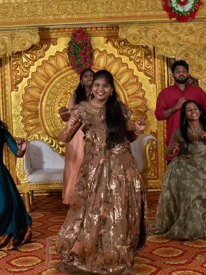 Another moment from a friends' group dance, showing their synchronized moves and happy faces. These performances are always a highlight of the sangeet.