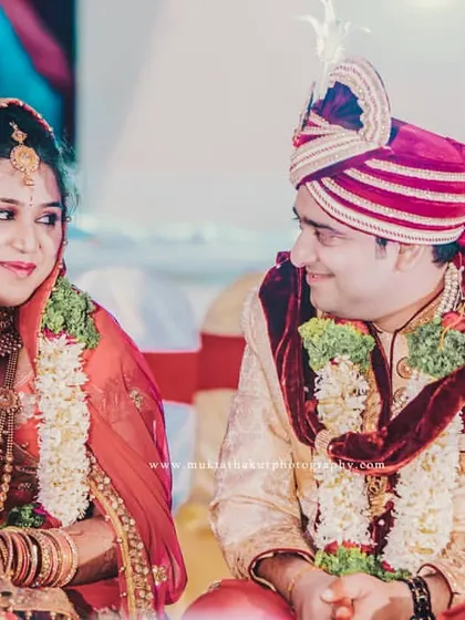 A sweet, knowing glance between the bride and groom during their wedding ceremony. These are the quiet moments that speak volumes.