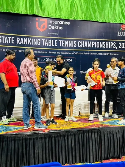 Our players, Prisha and Keshava, being presented with their trophies and certificates. These moments on the podium are what our intensive personal table tennis training programs are all about.