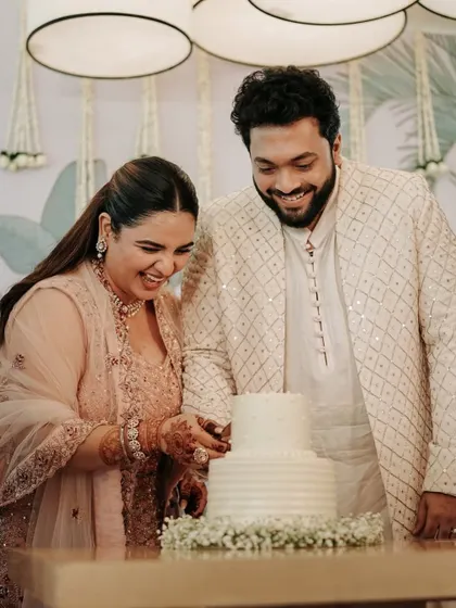 A candid shot of the happy couple. We had the honor of creating the bride's glowing look for her special day, focusing on a natural and radiant finish.