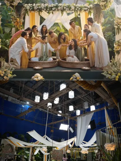 A before-and-after from an Ariel Matic commercial featuring MS Dhoni. The bottom image shows our overhead lighting rig, which was designed to create a bright, natural daylight feel for this wedding scene.