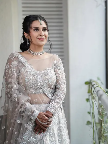 A beautiful portrait of the bride. Her skin looks flawless and her eyes are softly defined, creating a very elegant and modern bridal look.