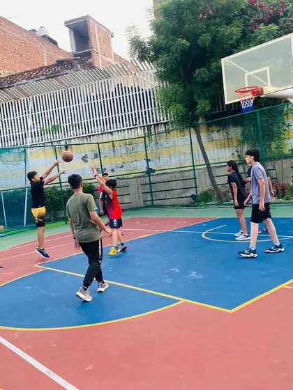 A player takes a jump shot.