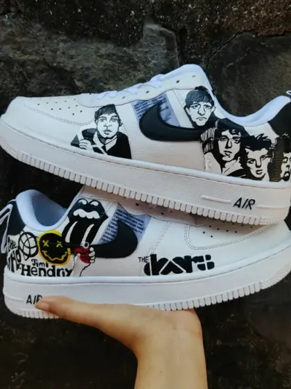 A custom pair for a classic rock fan. These Air Force 1s feature a montage of legendary bands like The Doors, The Rolling Stones, and Nirvana.
