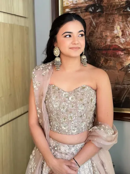 This is a perfect example of a simple, soft glam look. It's polished, pretty, and versatile enough for any party or pre-wedding function.