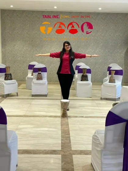 Our facilitator, Neoswal, setting up for a corporate session. We bring all the instruments and energy needed to make your event a success.