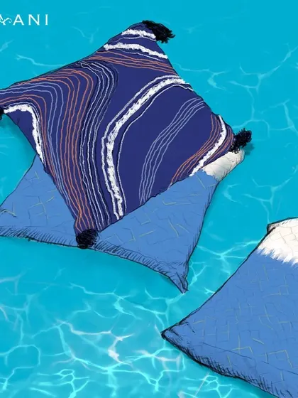 Your seaside getaway, right in your home. This artistic illustration of my Indigo collection cushions floating on water evokes a sense of calm, breezy relaxation and stylish comfort.