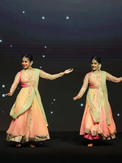 A graceful pose from our performance at the ET Achievers awards. The soft, flowing fabric of our costumes adds to the elegance of the Kathak movements.