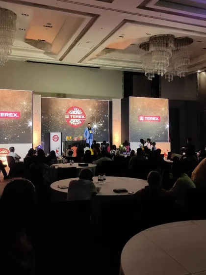 A view from the audience during the Terex corporate show. I make sure my performance is visible and engaging for everyone, even in a large, packed hall.