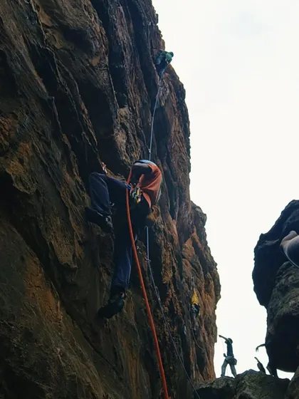 A climber ascends a steep, challenging route during our advanced course. The dramatic overhangs of Badami provide the perfect training ground for pushing your grade.