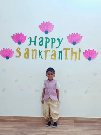 A duplicate of a previous image, showing a student dressed for the Makar Sankranti celebration.