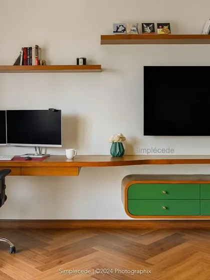 After: We transformed the master bedroom into an earthy retreat with a stunning green and rattan wardrobe, a custom study-cum-TV unit, and a cohesive design that feels grounded and serene.