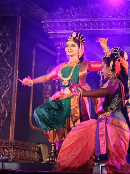 We offer 'Natya Seva' for sacred occasions, like this performance of 'Nava Durga' during a Navaratri festival. My students perform with devotion, their vibrant costumes and expressive storytelling creating a truly divine atmosphere for religious functions and temple events.