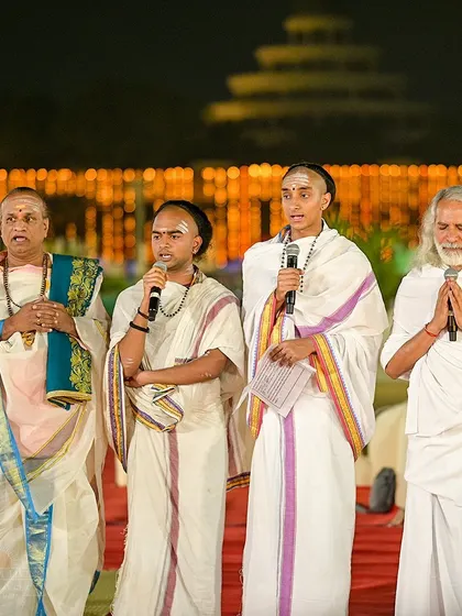 Our Vedic priests leading the chants during the Maha Shivratri celebration. Their powerful voices guide thousands of people into a meditative and devotional state.