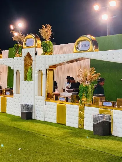 My new 2024 counter design, featuring a white padded facade with elegant gold arches and trim.