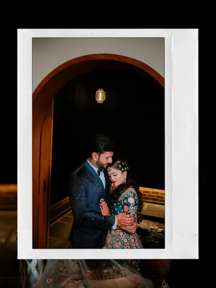 A romantic reception portrait of the couple, framed like a polaroid.