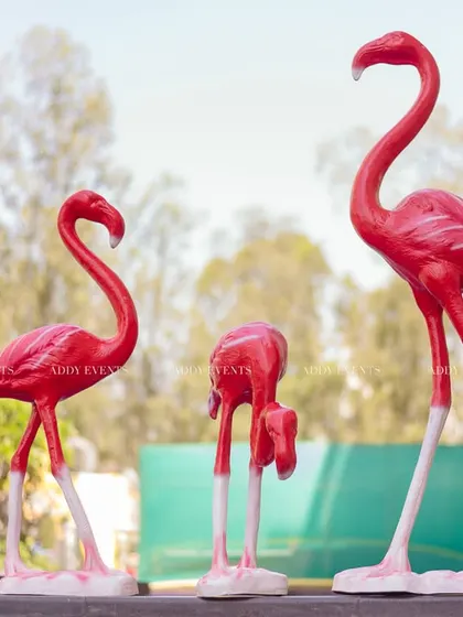 Adding a touch of tropical fun, these bright pink flamingo props were a quirky and memorable part of the Haldi decor.