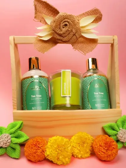 This styled shot of the shampoo and conditioner set uses decorative flowers to create an eye-catching image for social media.