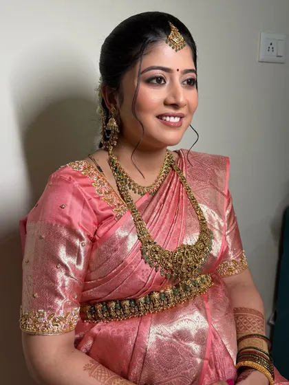 Another shot of Shruthi, looking happy and beautiful. The makeup is designed to be comfortable and long-lasting.