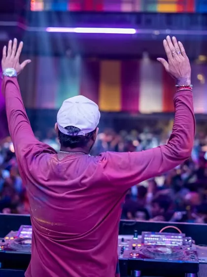 Hands up for the crowd at the Holi festival. Connecting with thousands of people at once is an unmatched feeling. This was one of the best Holi events, a true festival of colors and music.