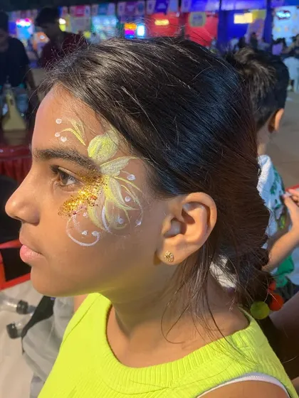 A beautiful yellow floral design with delicate white highlights and gold glitter.