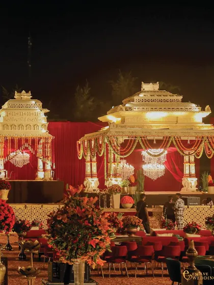 A closer look at the guest seating and mandap structures. The design seamlessly blends large-scale architecture with intimate dining spaces, ensuring every guest feels part of the grand yet personal celebration.