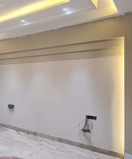 The actual work-in-progress photo of the same bedroom, showing how the 3D design is being brought to life on site.
