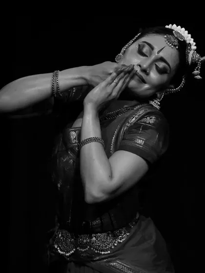 A black and white close-up capturing a moment of intense emotion and storytelling.