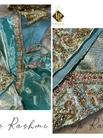A pastel turquoise blouse made from moonga silk, featuring delicate zardosi work with pink thread accents. The sheer panel at the back adds a touch of modern elegance.