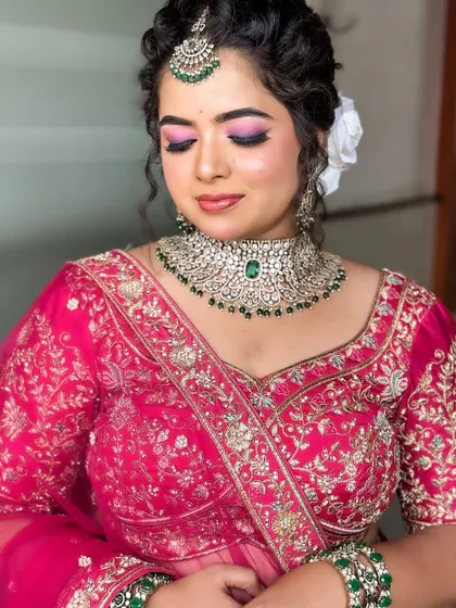 Another angle of this beautiful pink-themed look, showing the shimmer on the eyelids and the detailed jewelry.